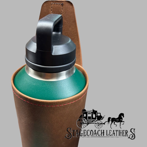 Forest Green Yeti water bottle in a brown leather Molle panelsleeve with Stagecoach Leathers logo.