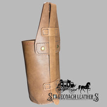 Load image into Gallery viewer, Brown leather Yeti bottle holster on a gray background with &#39;Stagecoach Leather&#39; branding. Molle panel straps visible. 